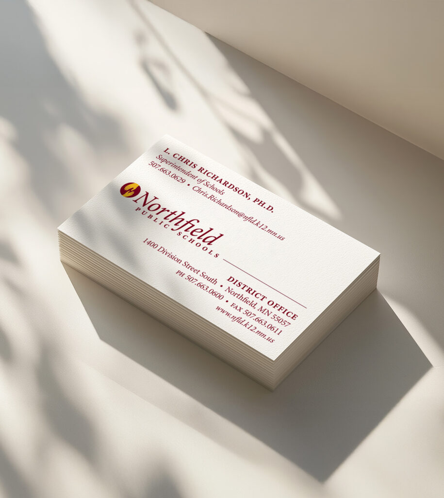 Stack of Northfield Public Schools' business cards.