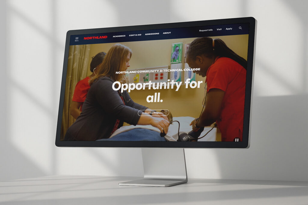 Mockup of Northland Community & Technical College website on a desktop computer. The computer screen has a photo of nursing students practicing CPR with the words “Opportunity for all.”