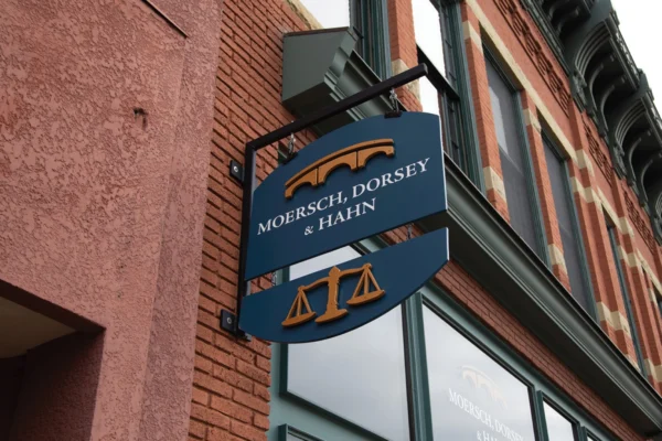 picutre of sign hanging from building - Moersch, Dorsey & Hahn